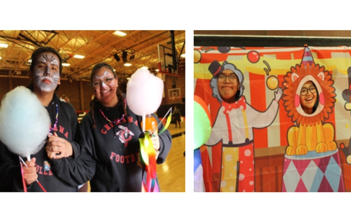 Kids eating cotton candy and taking photos at the Suicide Prevention Carnival.