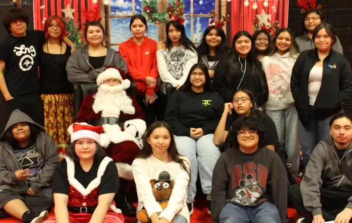Students posing with Santa